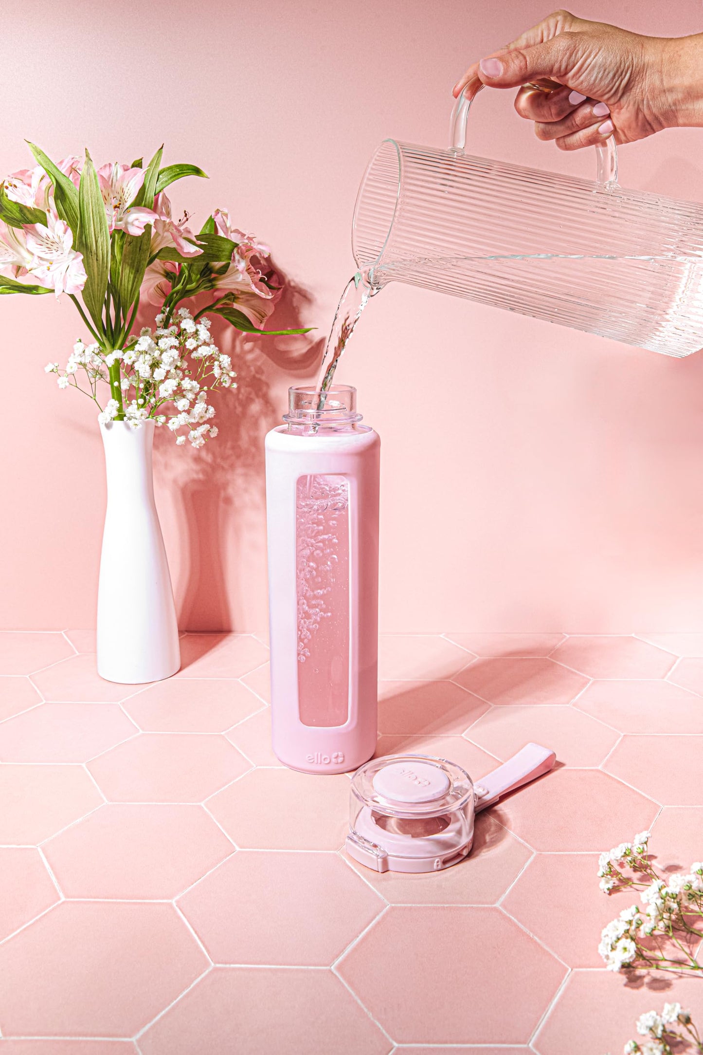 20 oz Ello Syndicate Reusable Glass Water Bottle with One-Touch Leak-Proof Flip Lid, Non-Slip Silicone Sleeve, Carry Loop, BPA-Free, Dishwasher Safe, Cashmere Pink